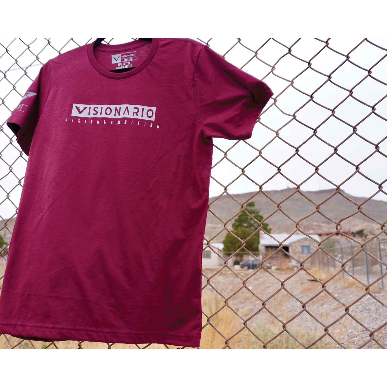 HEATHER CARDINAL TEE WITH "VISIONARIO", "VISION & AMBITION" GREY DESIGN ON CENTER CHEST.