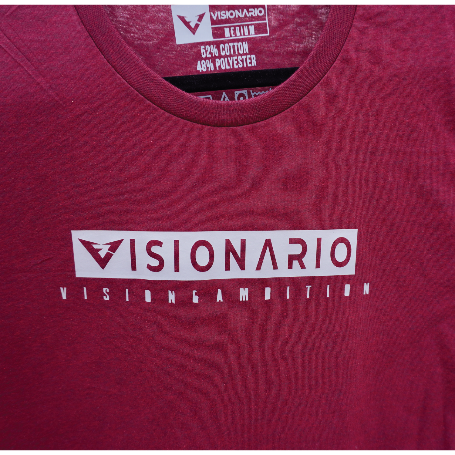 HEATHER CARDINAL TEE WITH "VISIONARIO", "VISION & AMBITION" GREY DESIGN ON CENTER CHEST.