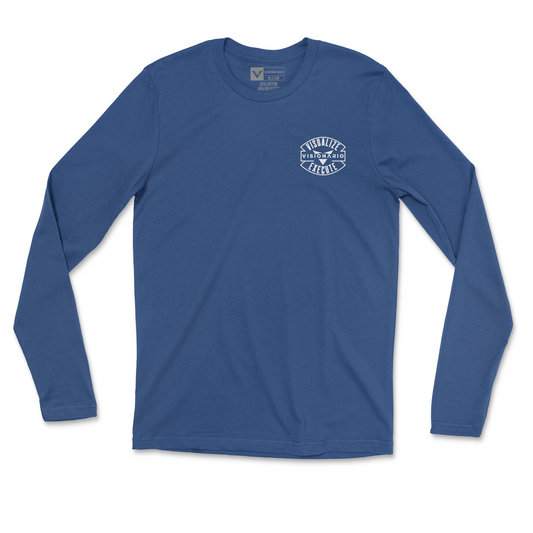 Royal blue long sleeve with design in all white color. Front pocket size logo and back of long sleeve there's a large skull with USA flag full brim hard hat. "VISION AND AMBITION" phrase above design on back.